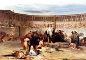 Nineteenth-century painting of Christian martyrs standing and lying on the sand of a Roman amphitheatre while lions approach and tiers of spectators look on